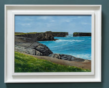 Load image into Gallery viewer, Framed painting of a coastal landscape with rocks and blue sky.