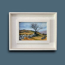 Load image into Gallery viewer, Framed painting of a landscape with a tree on a blue background