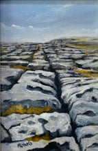 Load image into Gallery viewer, Painting of a landscape with rocky terrain and a clear sky