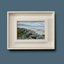Load image into Gallery viewer, Framed artwork of a coastal landscape with rocks and water on a blue background