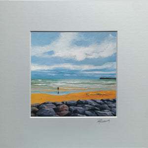 Painting of a beach scene with a person, rocks, and water on a gray background